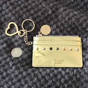 Gold Victoria’s Secret keychain wallet.